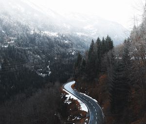 Preview wallpaper road, winding, trees, mountains, snowy