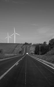 Preview wallpaper road, windmills, car, bw