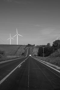 Preview wallpaper road, windmills, car, bw