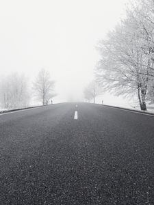 Preview wallpaper road, winter, bw, snow, fog, trees, direction