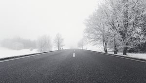 Preview wallpaper road, winter, bw, snow, fog, trees, direction