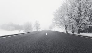 Preview wallpaper road, winter, bw, snow, fog, trees, direction