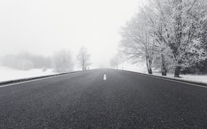Preview wallpaper road, winter, bw, snow, fog, trees, direction