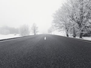 Preview wallpaper road, winter, bw, snow, fog, trees, direction