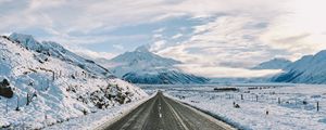 Preview wallpaper road, winter, mountains, marking, asphalt, snow