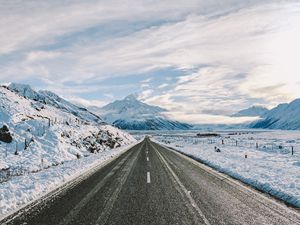 Preview wallpaper road, winter, mountains, marking, asphalt, snow