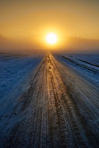 Preview wallpaper road, winter, snow, sunset, horizon