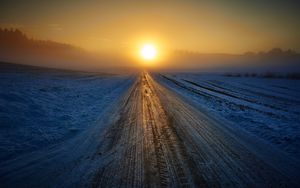 Preview wallpaper road, winter, snow, sunset, horizon