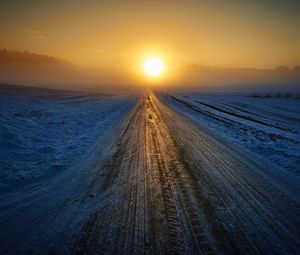 Preview wallpaper road, winter, snow, sunset, horizon