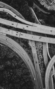 Preview wallpaper roads, cars, trees, black and white, aerial view