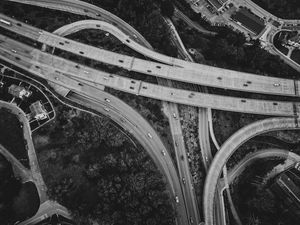 Preview wallpaper roads, cars, trees, black and white, aerial view