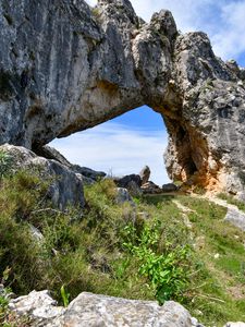 Preview wallpaper rock, arch, grass, stones, nature