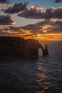 Preview wallpaper rock, arch, sea, waves, sunset, landscape