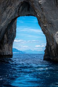 Preview wallpaper rock, arch, sea, view, mountains, landscape