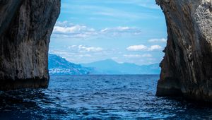 Preview wallpaper rock, arch, sea, view, mountains, landscape