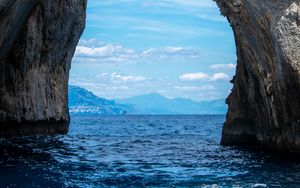 Preview wallpaper rock, arch, sea, view, mountains, landscape