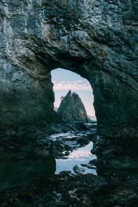 Preview wallpaper rock, arch, water, silhouette, nature