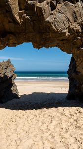 Preview wallpaper rock, beach, sand, sea, shadow, nature