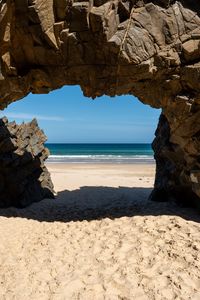 Preview wallpaper rock, beach, sand, sea, shadow, nature