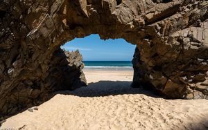 Preview wallpaper rock, beach, sand, sea, shadow, nature