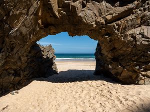 Preview wallpaper rock, beach, sand, sea, shadow, nature