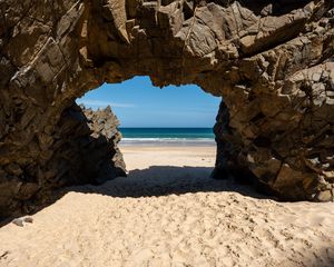 Preview wallpaper rock, beach, sand, sea, shadow, nature