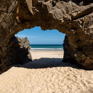 Preview wallpaper rock, beach, sand, sea, shadow, nature