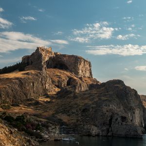 Preview wallpaper rock, cave, ruins, sea, boat