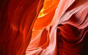 Preview wallpaper rock, cave, waves, nature, light, red