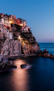 Preview wallpaper rock, city, sea, sunset, italy