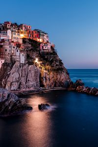 Preview wallpaper rock, city, sea, sunset, italy