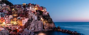 Preview wallpaper rock, city, sea, sunset, italy