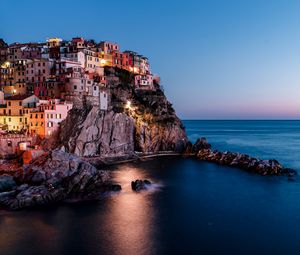 Preview wallpaper rock, city, sea, sunset, italy