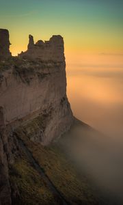 Preview wallpaper rock, cliff, fog, mountain, height, stone