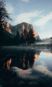 Preview wallpaper rock, cliff, fog, water