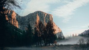 Preview wallpaper rock, cliff, fog, water