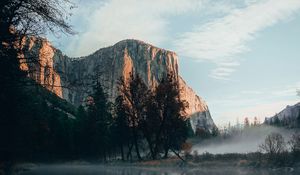 Preview wallpaper rock, cliff, fog, water