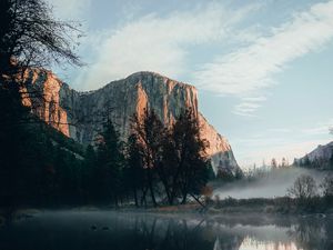 Preview wallpaper rock, cliff, fog, water