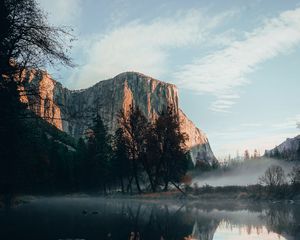 Preview wallpaper rock, cliff, fog, water