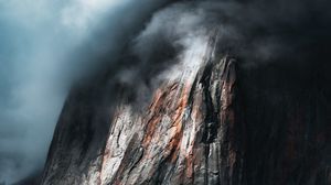 Preview wallpaper rock, cliff, relief, clouds, dark