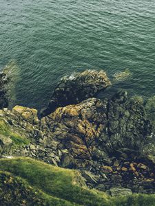 Preview wallpaper rock, cliff, sea, stones, nature