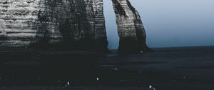 Preview wallpaper rock, cliff, sea, coast, twilight