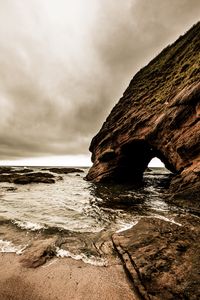 Preview wallpaper rock, cliff, sea, waves, beach