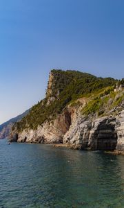 Preview wallpaper rock, cliff, sea, trees, sky