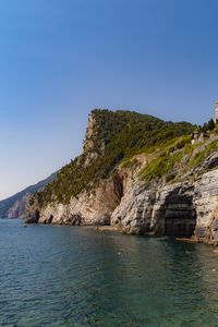 Preview wallpaper rock, cliff, sea, trees, sky