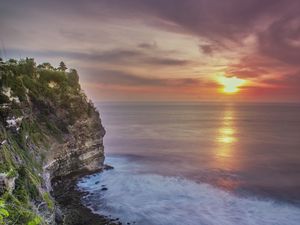 Preview wallpaper rock, cliff, shore, sun, waves