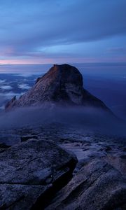 Preview wallpaper rock, cliff, stone, clouds, fog
