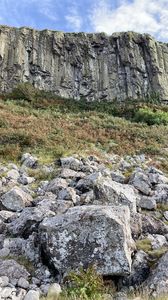 Preview wallpaper rock, cliff, stones, bushes