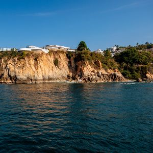Preview wallpaper rock, cliff, trees, sea, landscape