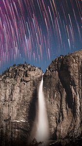 Preview wallpaper rock, cliff, waterfall, starry sky, long exposure, stone